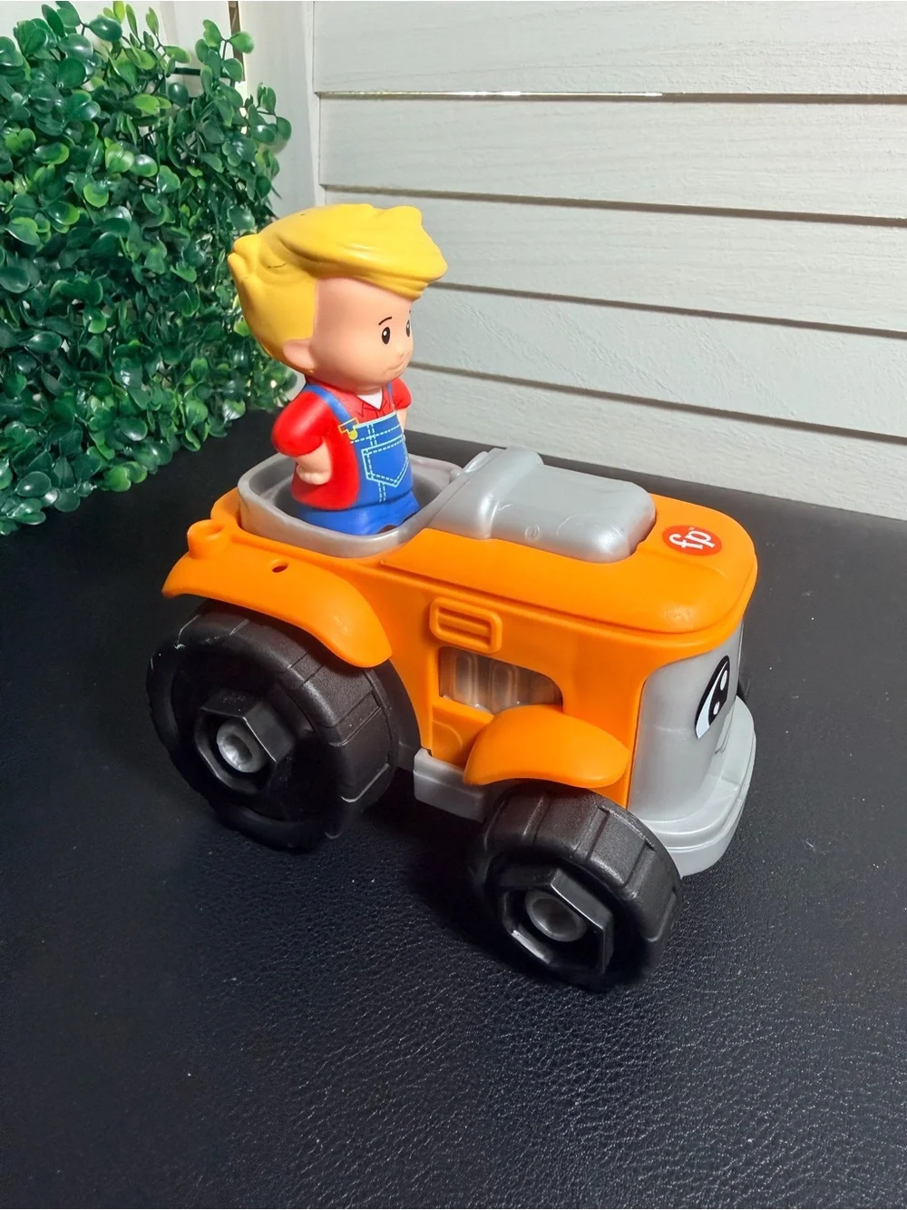 Fisher-Price Little People Smiling Push Lawn Mower with removable Blonde Driver